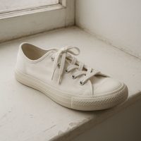Zapatilla de lona blanca